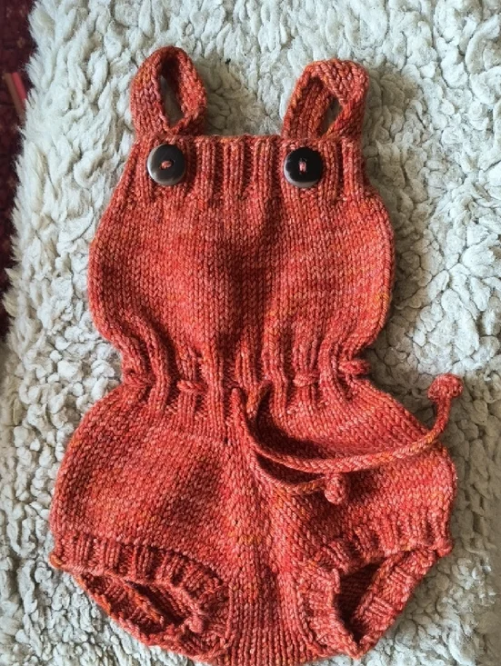 Misha And Puff Hand-Knit Baby Romper in Burnt Orange - Picture 2 of 3